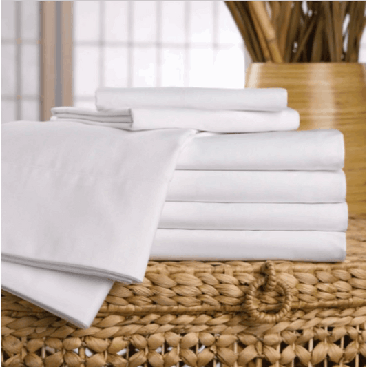Martex Ultra Touch Microfiber Flat Sheets stacked neatly, showcasing their softness and durability for ultimate comfort.