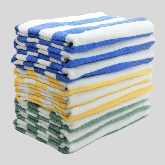 Colorful Oxford Basic Stripe Pool Towels 30" x 60" stacked neatly, perfect for enhancing poolside elegance.