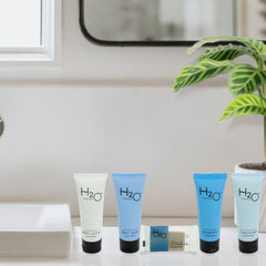 a set of guest amenities in a beautiful bathroom