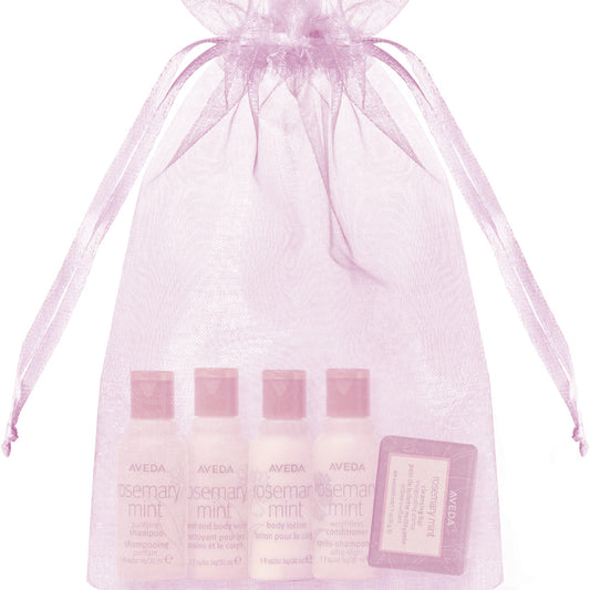Aveda Rosemary Mint Toiletry Bags feature luxurious mini products for a premium guest experience in stylish packaging.