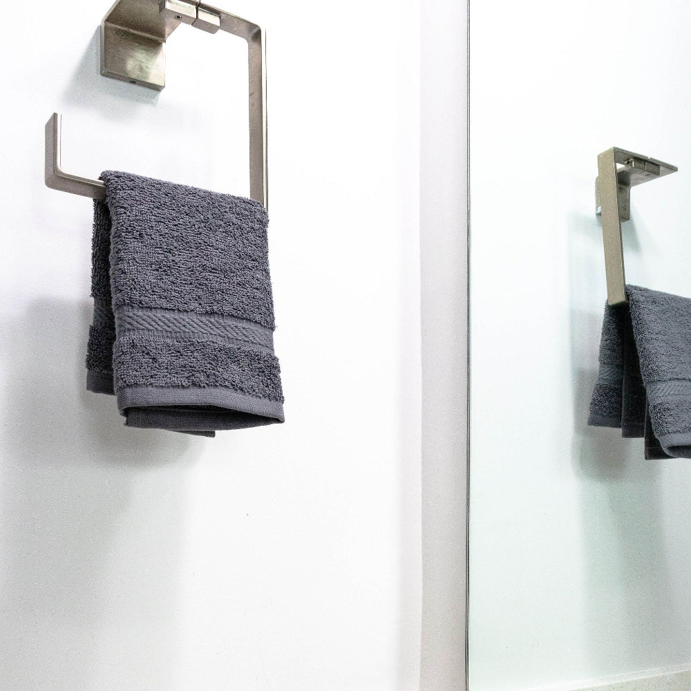 Oxford Imperiale Grey Washcloth hanging elegantly, ideal for enhancing any bathroom décor in hotels or Airbnb.