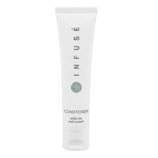 Luxurious Infusé White Tea & Coconut Conditioner for soft, hydrated hair in eco-friendly packaging. Perfect for a nourishing treat.