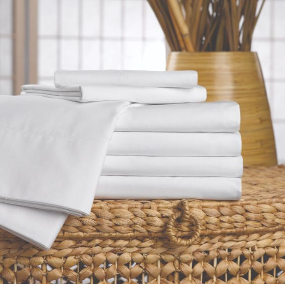 Martex Ultra Touch Microfiber Pillowcases stacked neatly, offering ultimate comfort and durability for guests.
