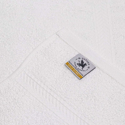 Luxurious Oxford Gold Dobby Towels in brilliant white, combining softness and durability for lasting performance.