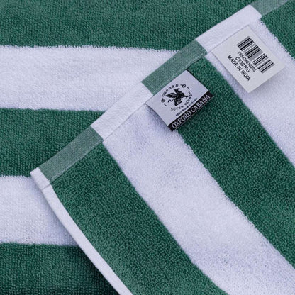 Soft and durable Oxford Premium Cabana Stripe Towels 30"x70" in green, perfect for enhancing your poolside experience.