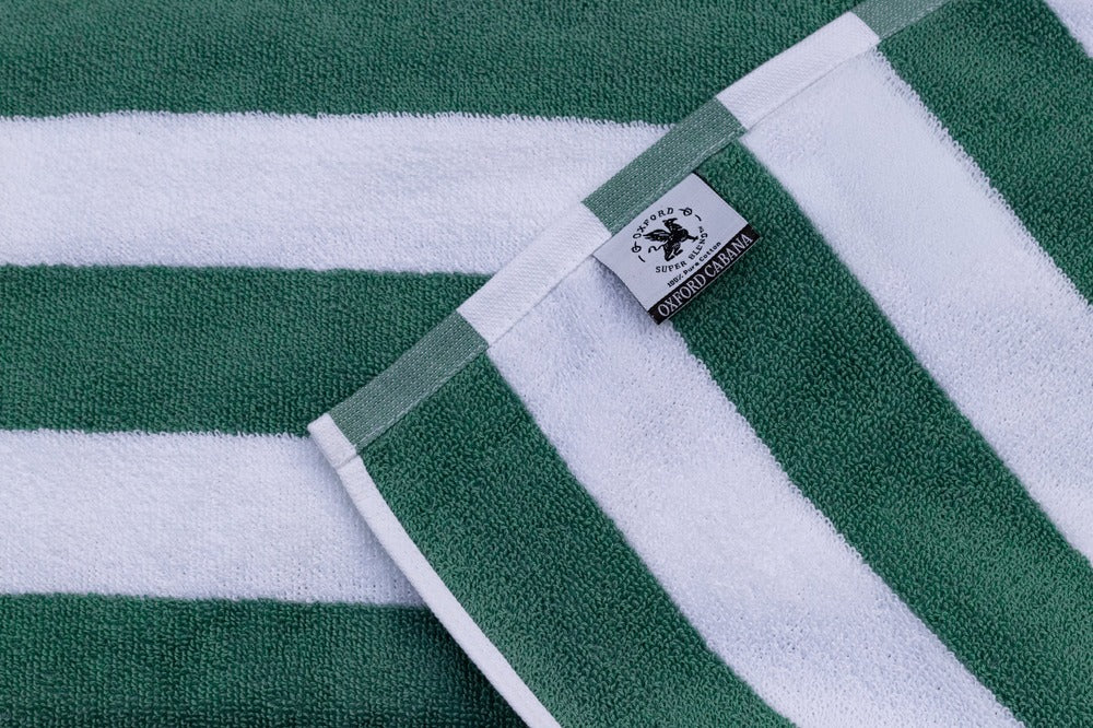 Oxford Premium Cabana Stripe Towels 30"x70" feature soft, absorbent cotton in a stylish green and white design.