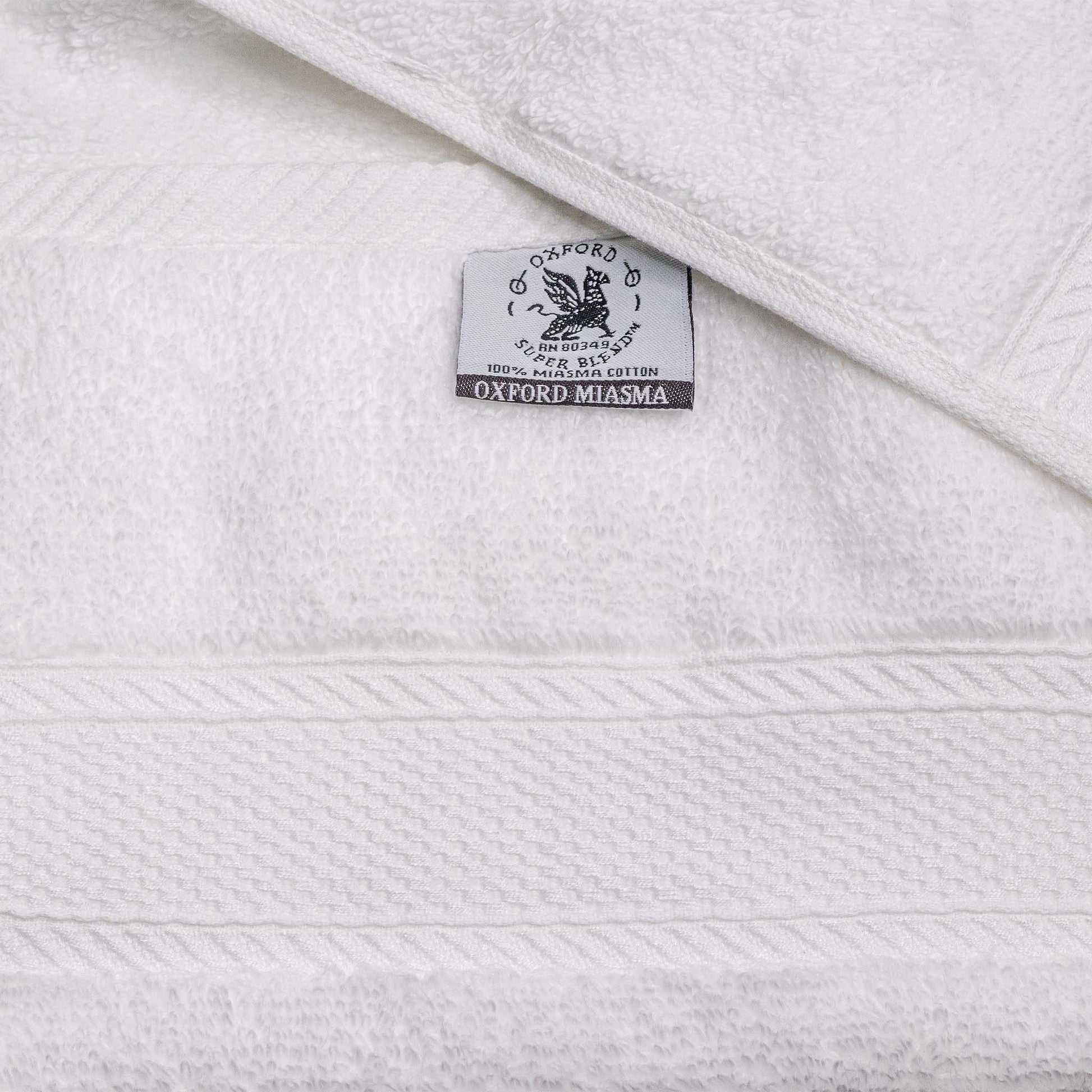 Luxurious Oxford Miasma Bath towels featuring soft zero twist cotton and elegant dobby border, perfect for hotels.