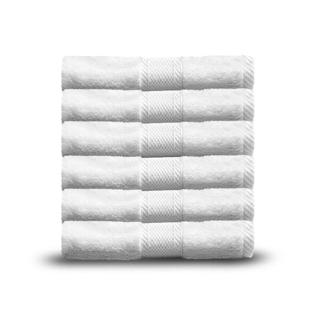 Luxurious Oxford Miasma Bath towels stacked neatly, featuring soft, quick-drying zero twist cotton for hotels.