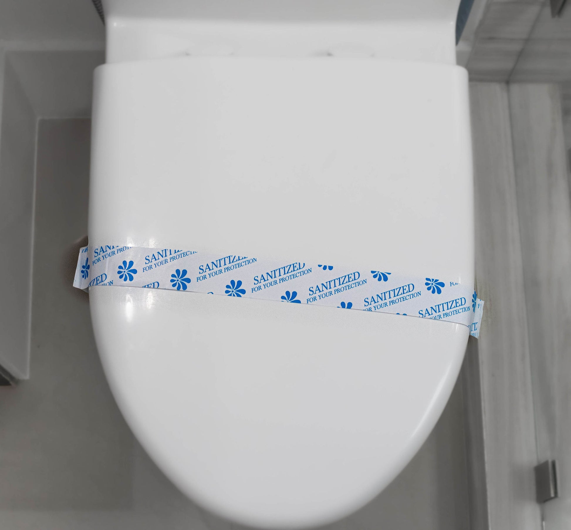 Toilet Seat Sanitized Band – Case of 1000 ensures a hygienic experience, marked "Sanitized for Your Protection."