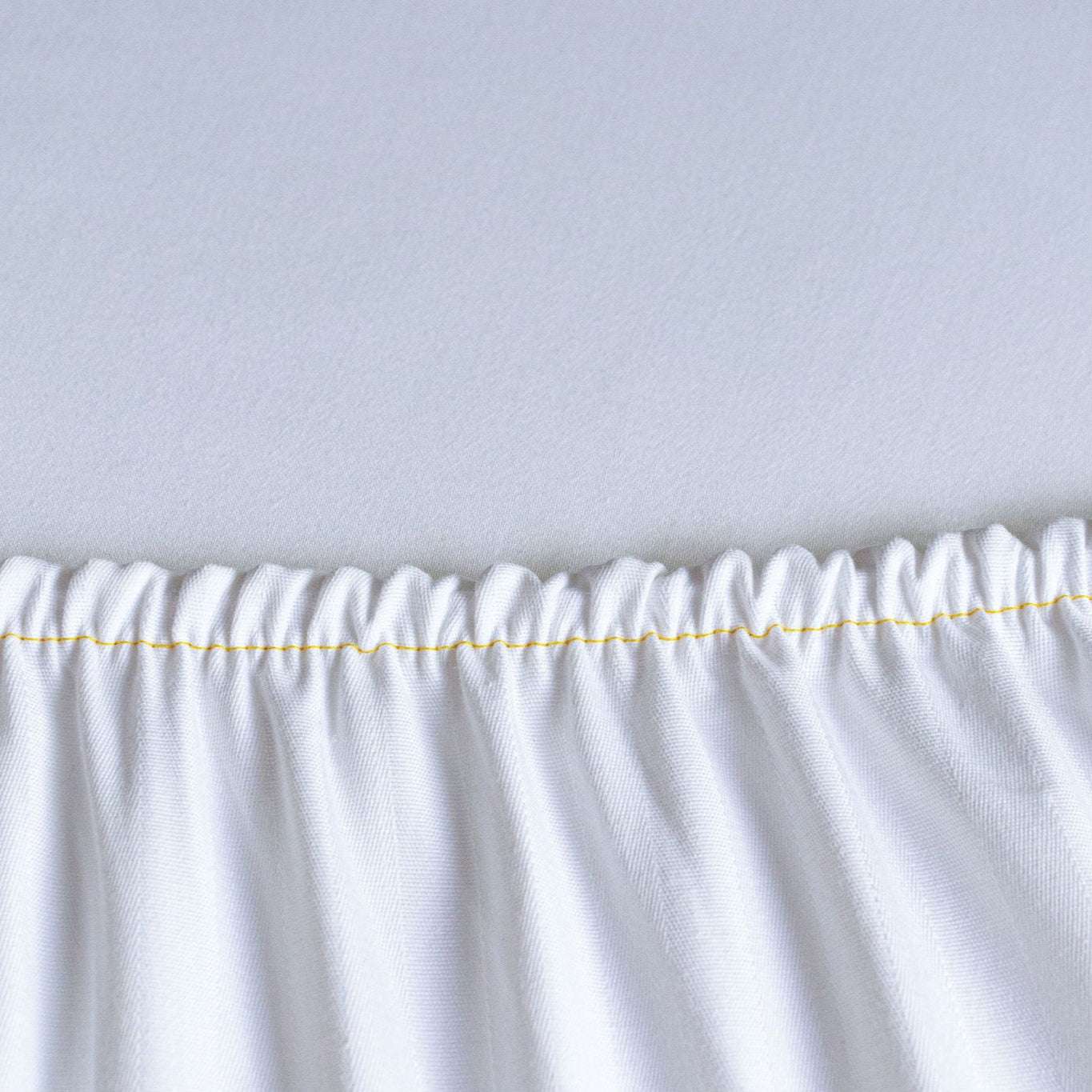 Snug and durable, T-300 Fitted Sheets by Thomaston Mills ensure comfort for guest beds in the hospitality industry.